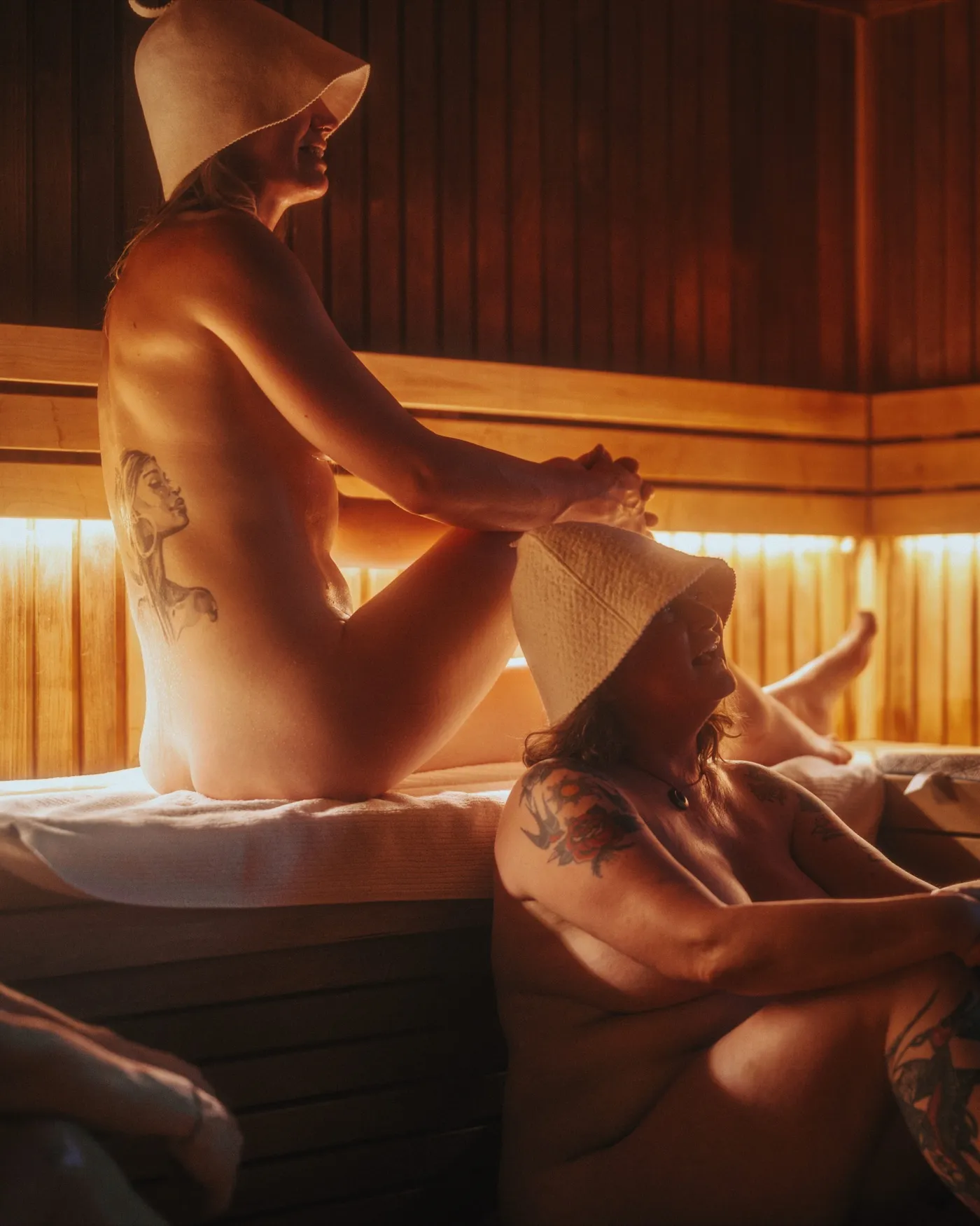 Bathers sharing a relaxed moment together in the sauna at Blue Mountains Sauna