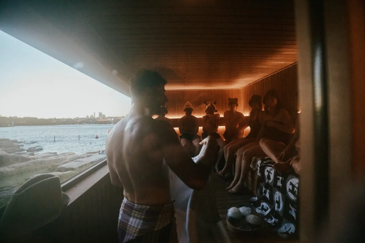 An outdoor Australian Sauna Association gathering on Sydney Harbour