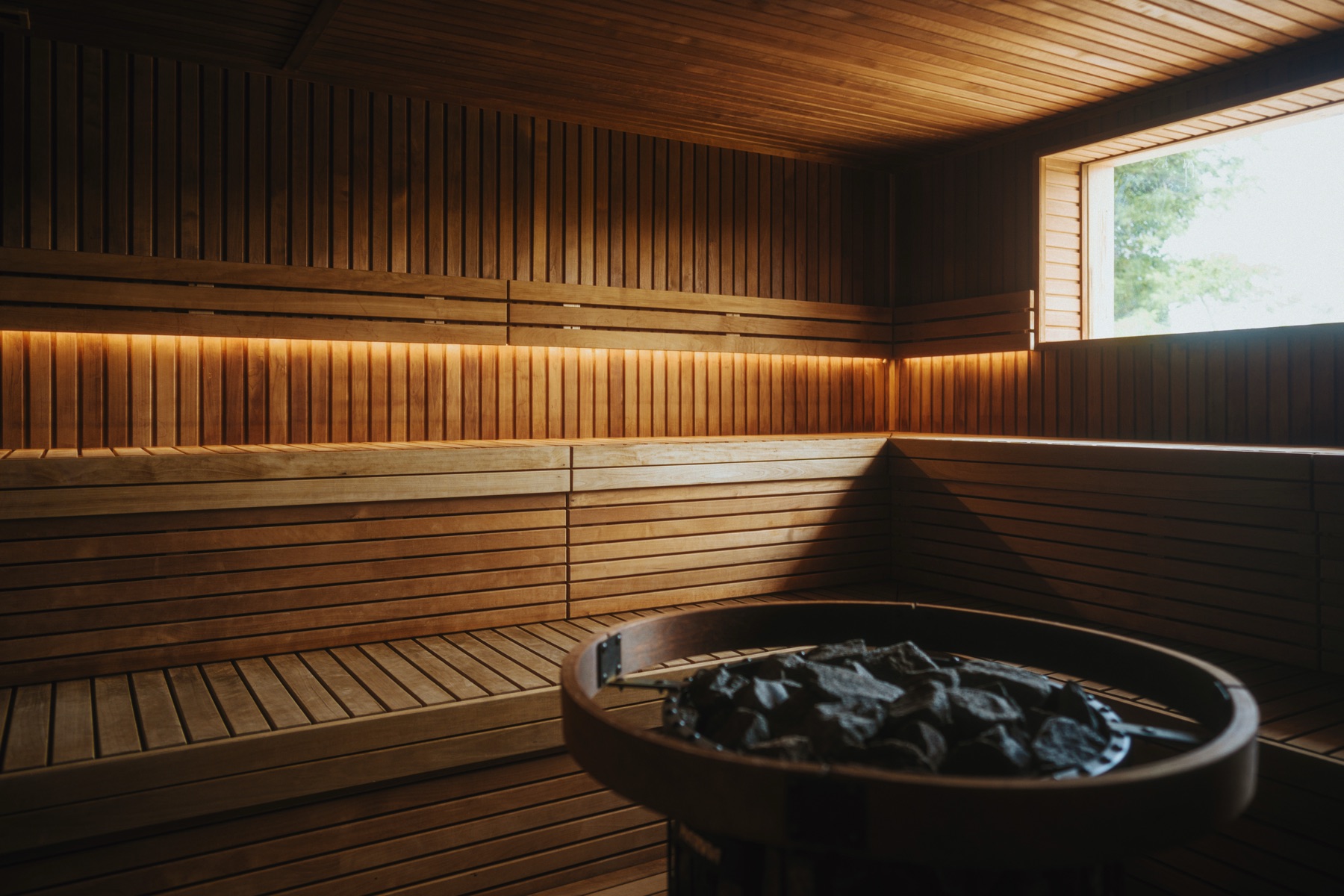 The Aufguss sauna interior and stone heater