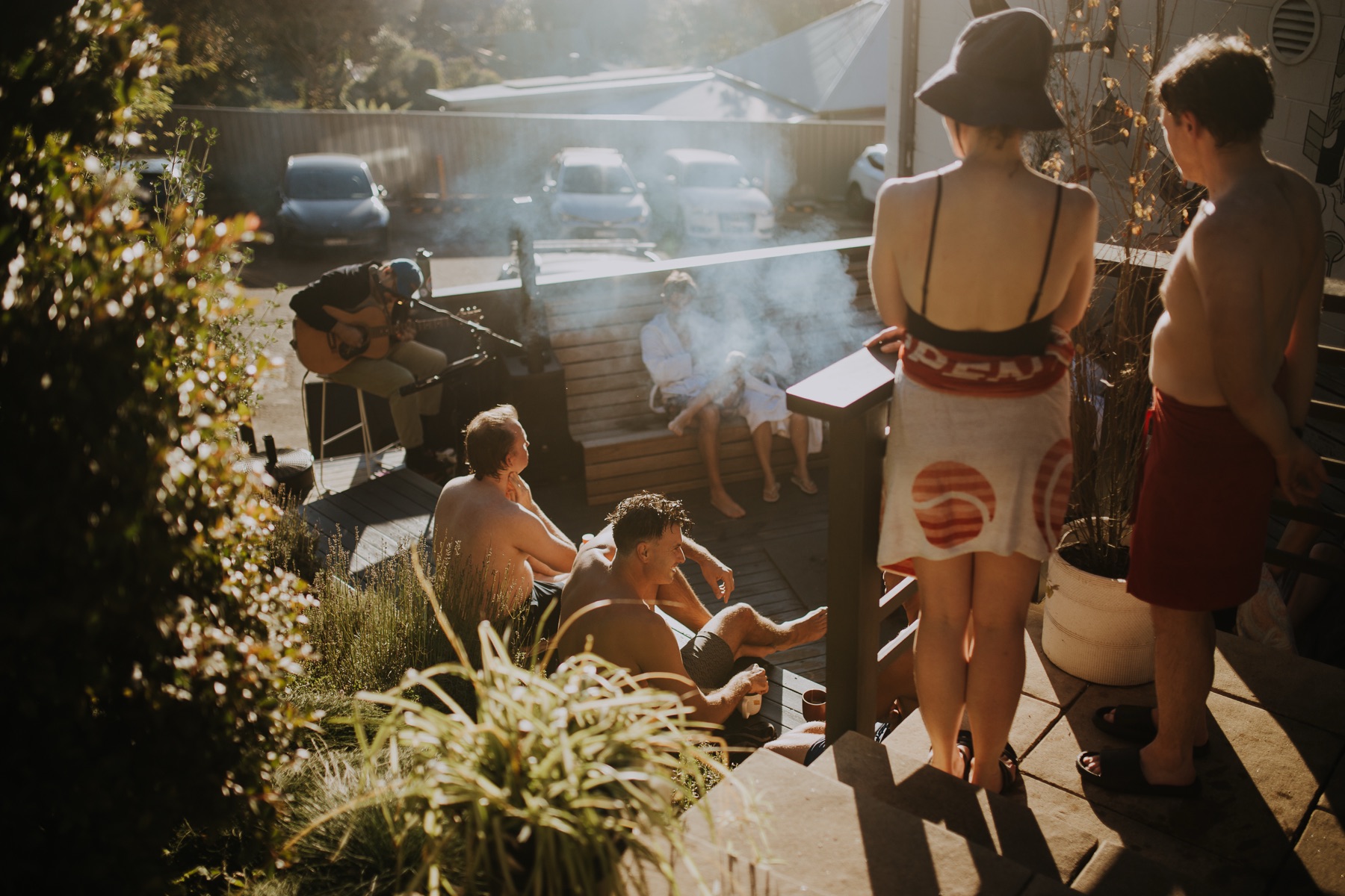 Guests relaxing outdoors with live music